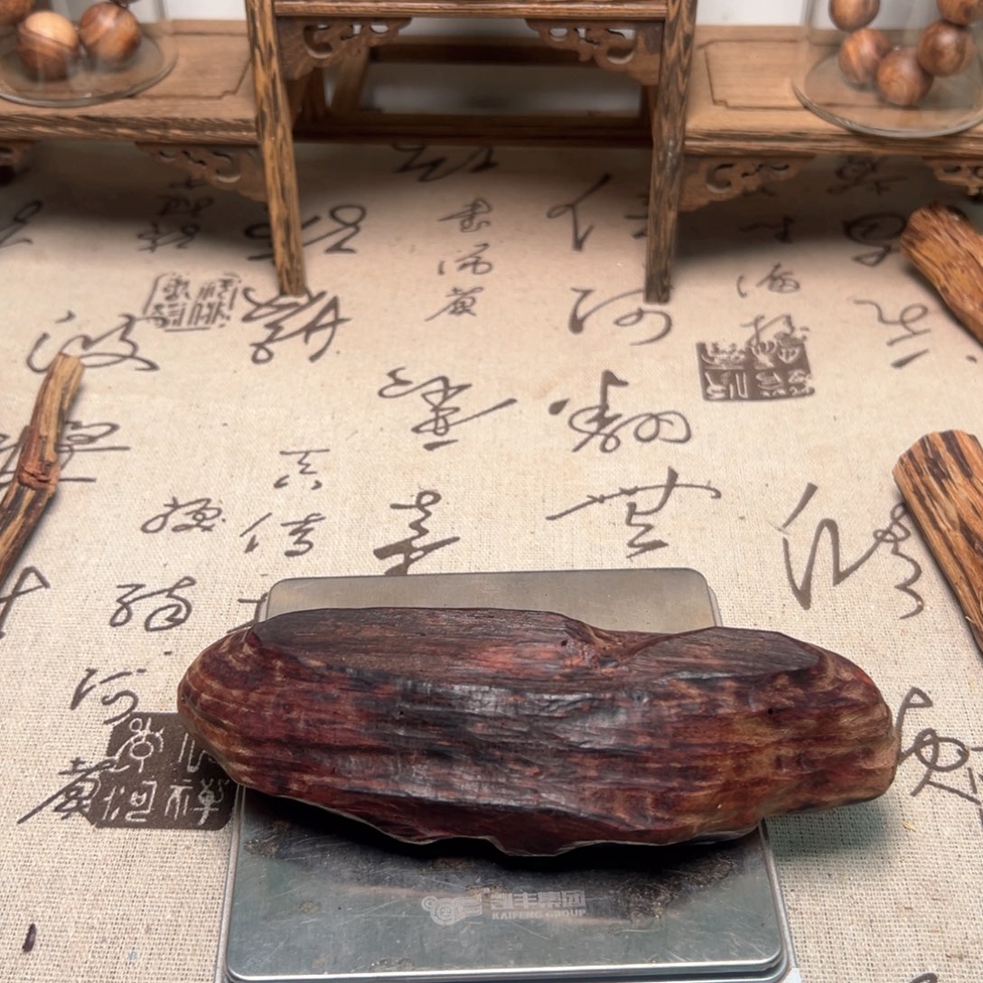 李***泳香榧木海南满油花梨公132克