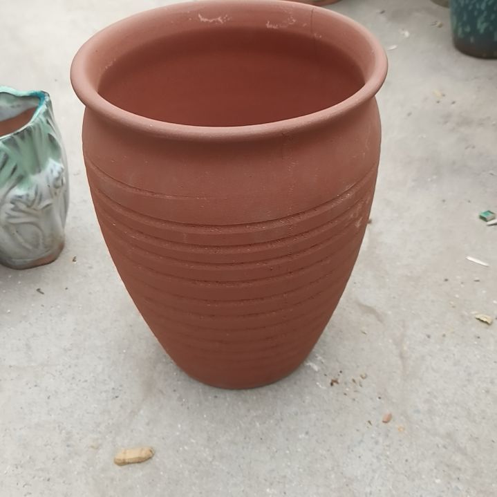 红陶口20高27瑕疵底部烧裂