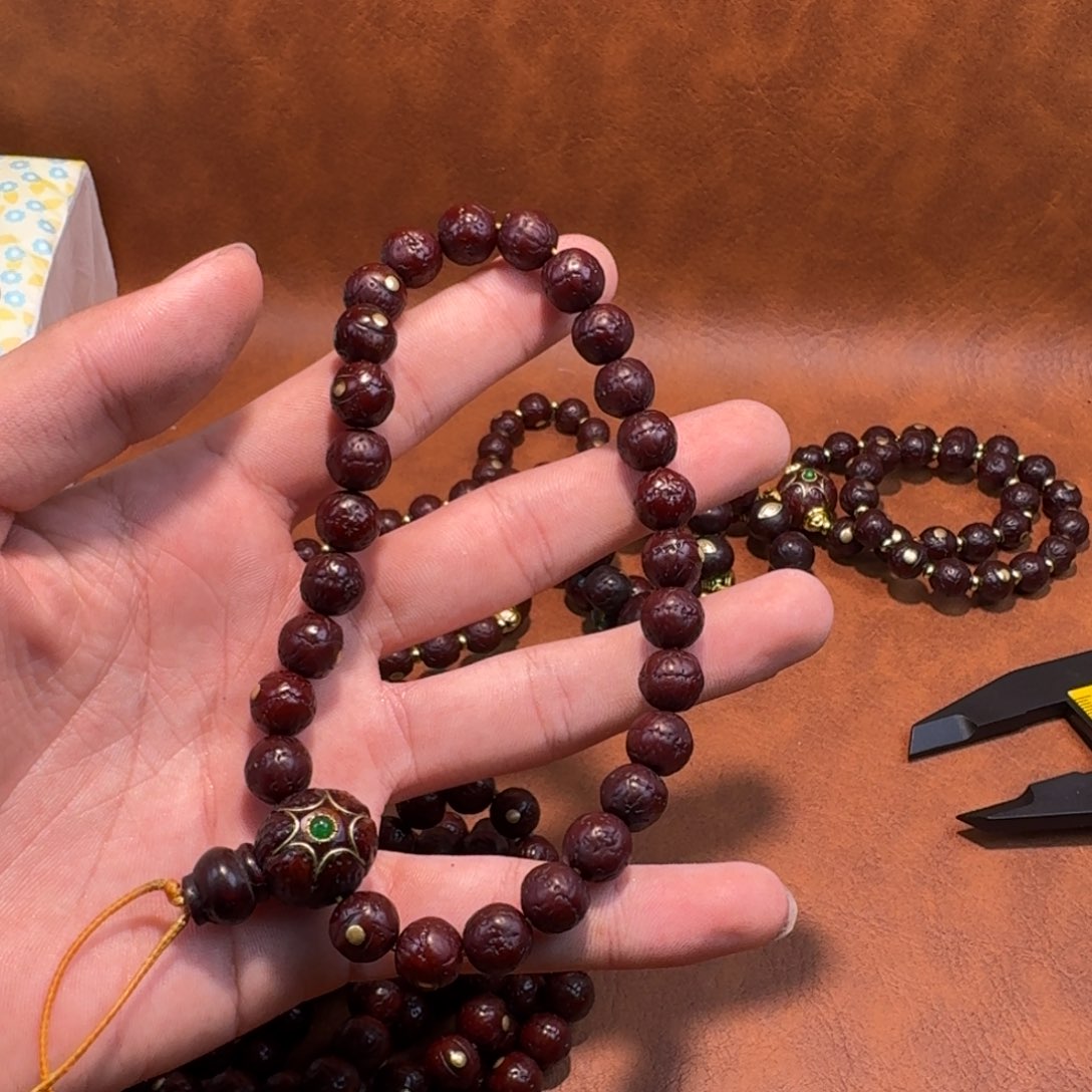 究***义凤眼菩提吊坠镶嵌手串9+