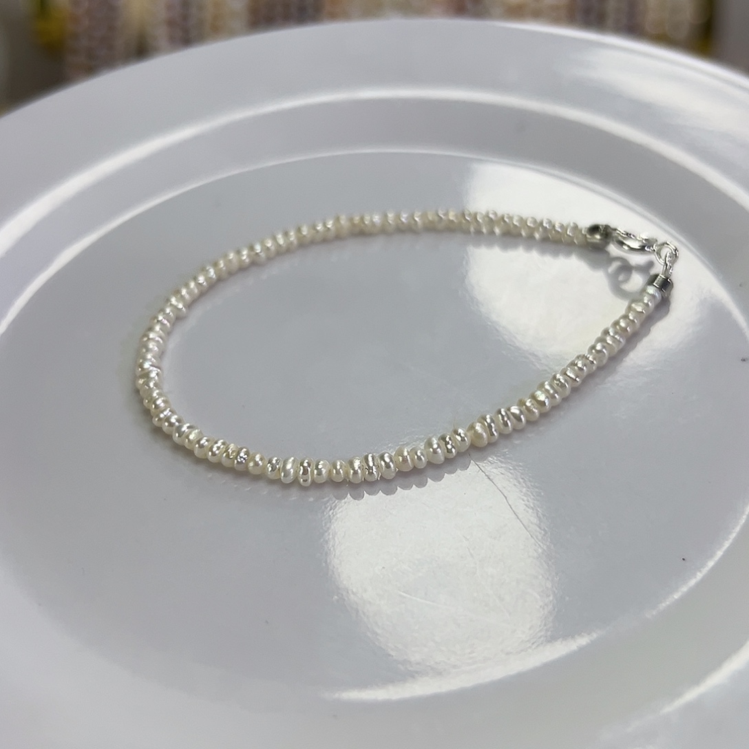 手绳淡水珍珠钛钢