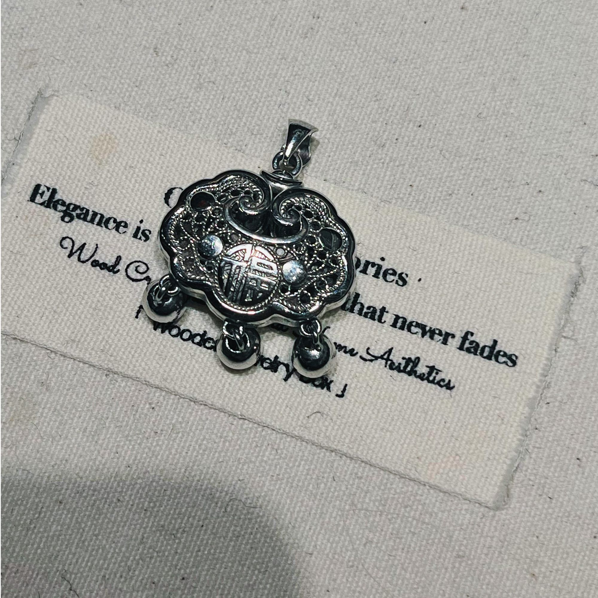 铂金950锁包吊坠
