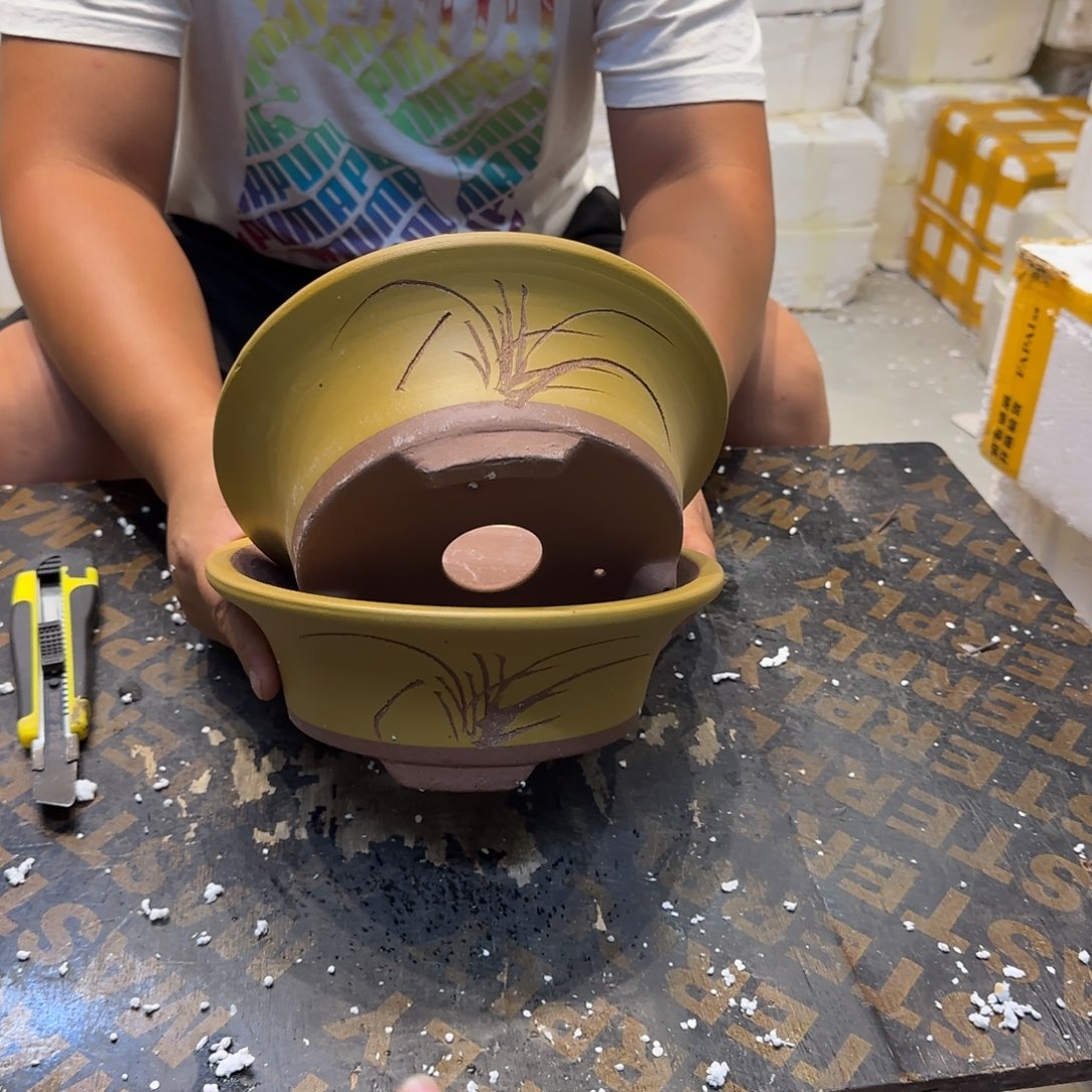 紫砂花盆瑕疵和瑕疵