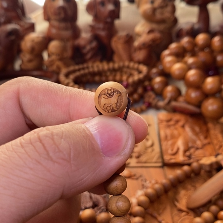 桃木属狗的圆珠….