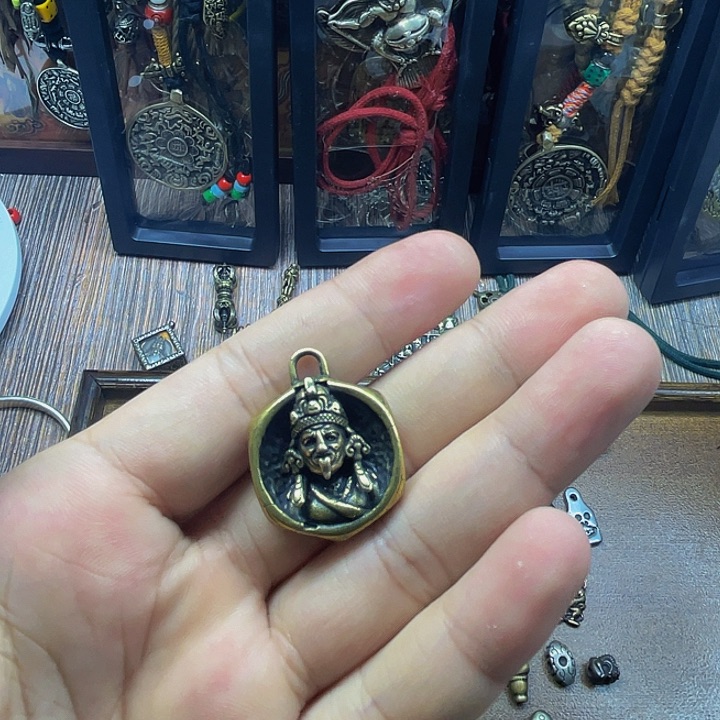 黄铜小挂饰扎基拉姆戴面具
