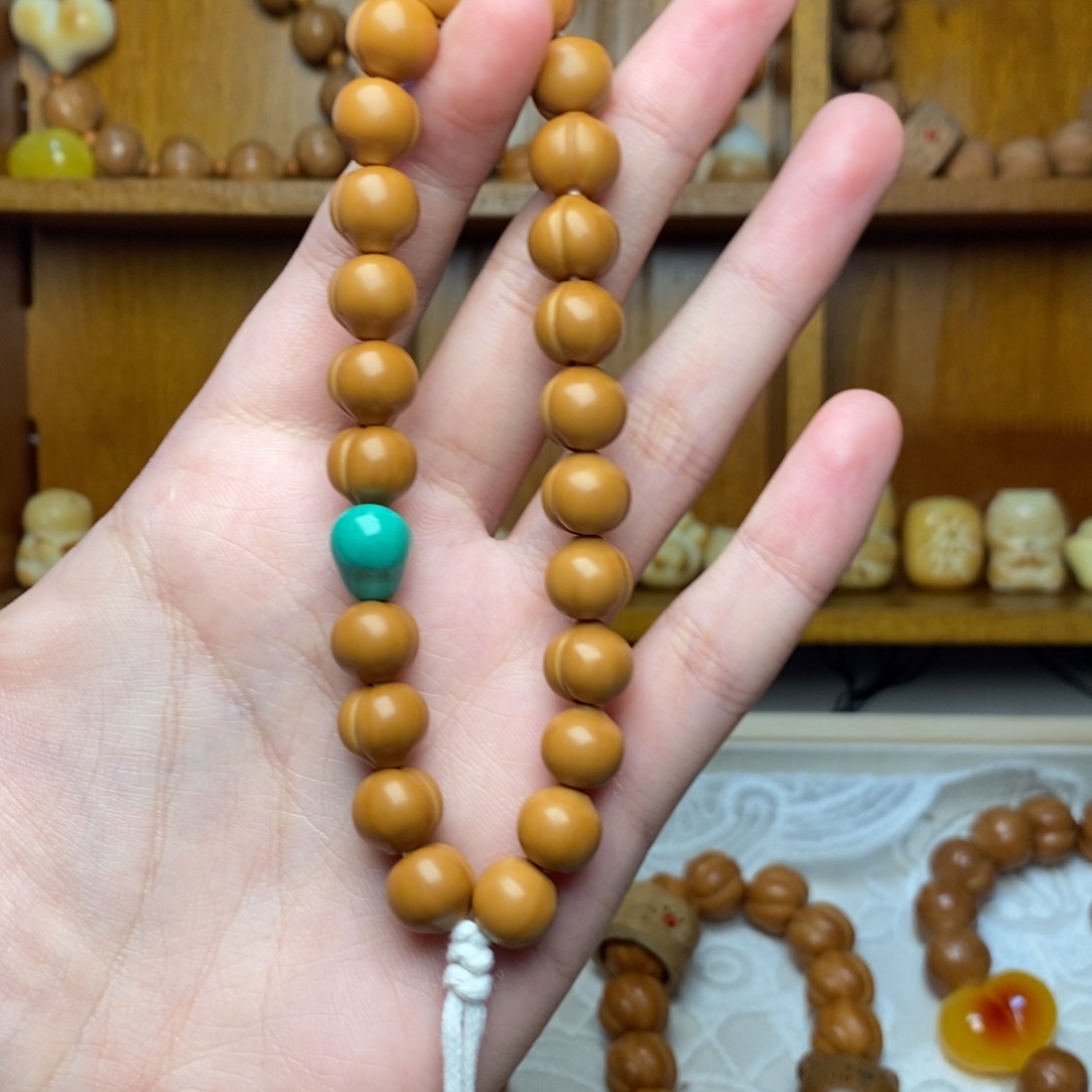 茜***茜把件猴头核桃屁桃