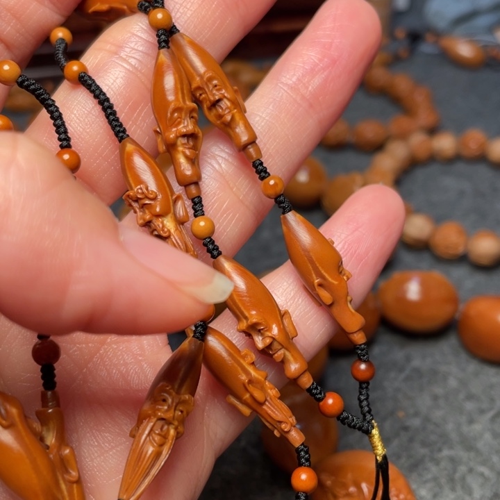 橄榄核吊坠呲***计橄榄核