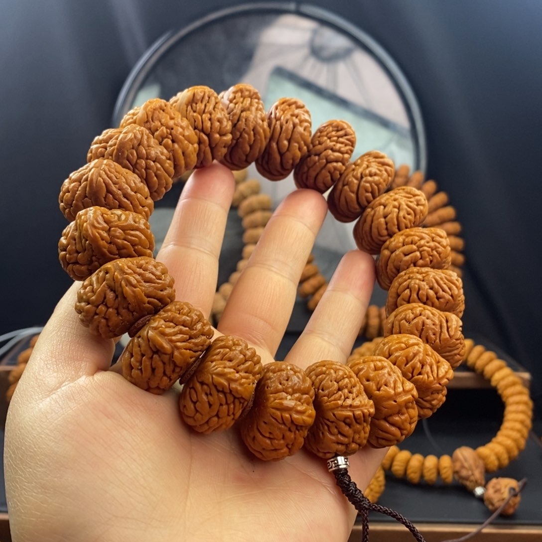 桃核手串串****兔龙纹桃核麒麟