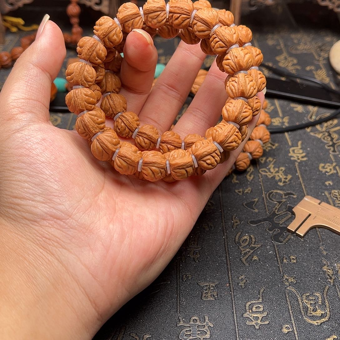 桃核吊坠小金豆手串