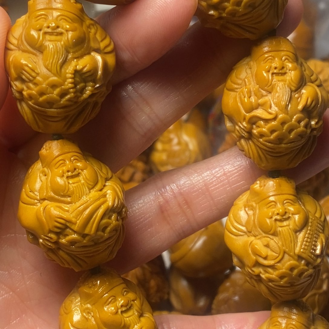 橄榄核手串/手链郎腰缠万贯财神