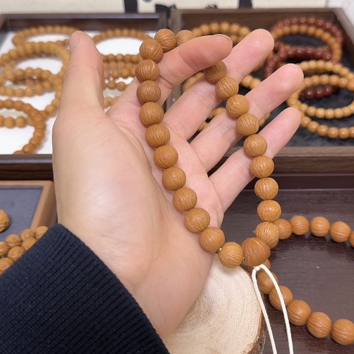 那***啦猴头核桃吊坠凤羽