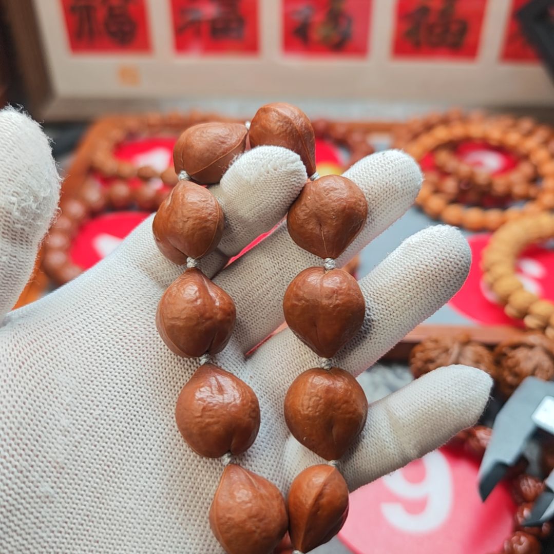 余***由手串文玩核桃屁桃手持