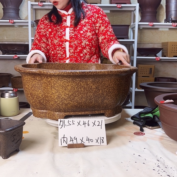 紫砂花盆貴**持紫砂花盆