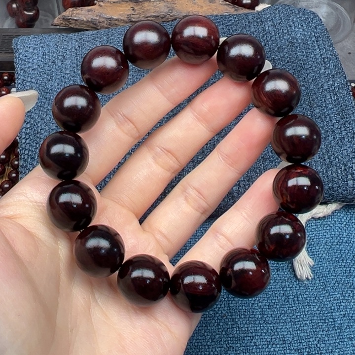 东***叶木海南红降花梨公黑金火焰纹1.5圆珠（瑕）