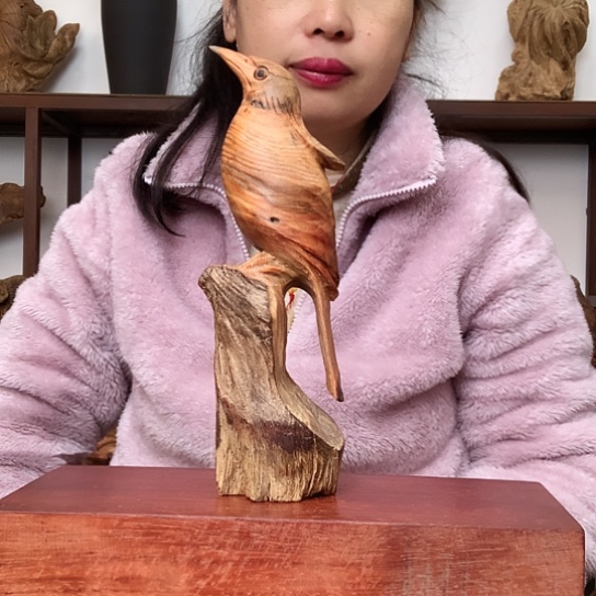 哈***。木琥珀木小鸟摆件