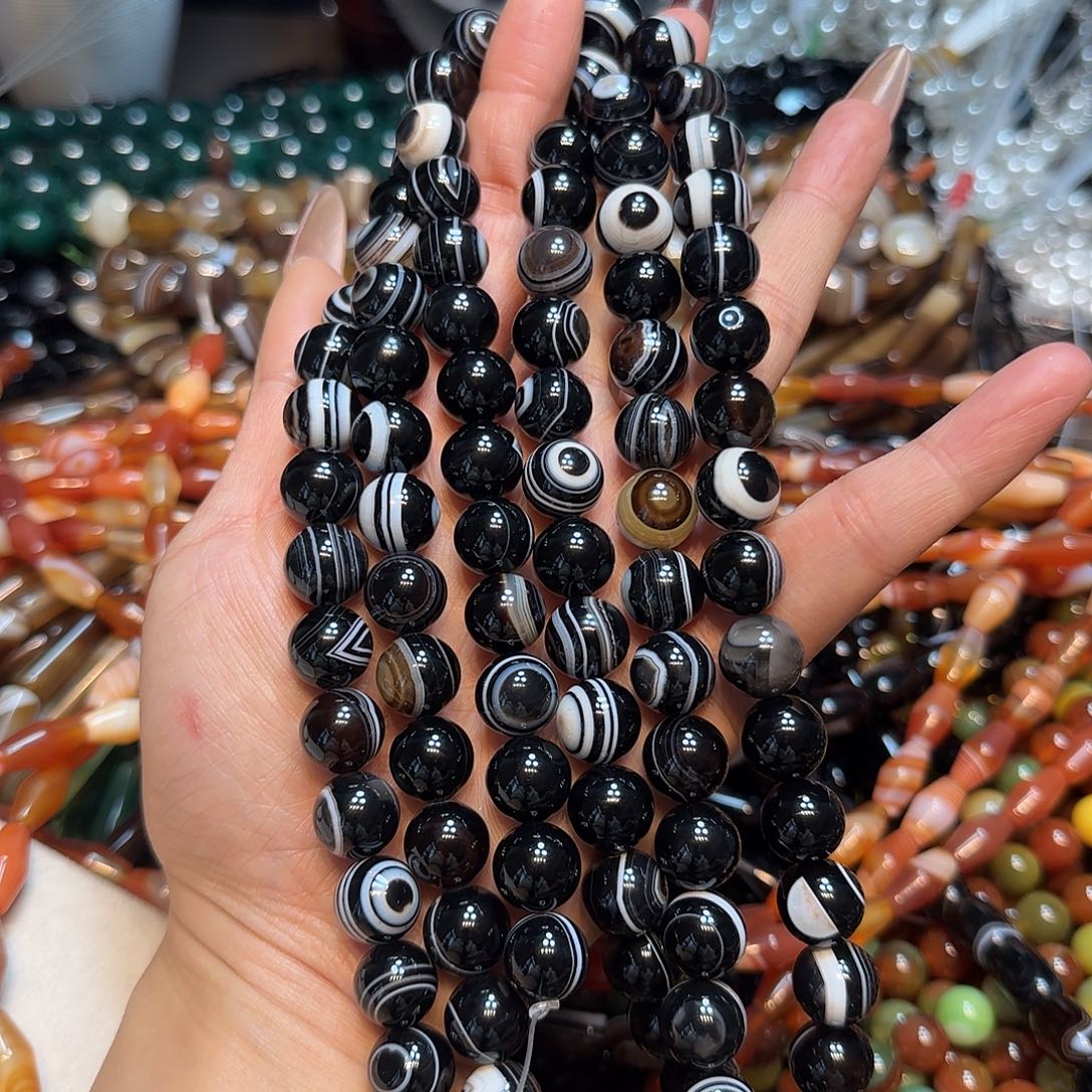 玛瑙/玉髓未镶嵌珠宝半成品天然黑玛瑙板眼蚕丝一条12mm