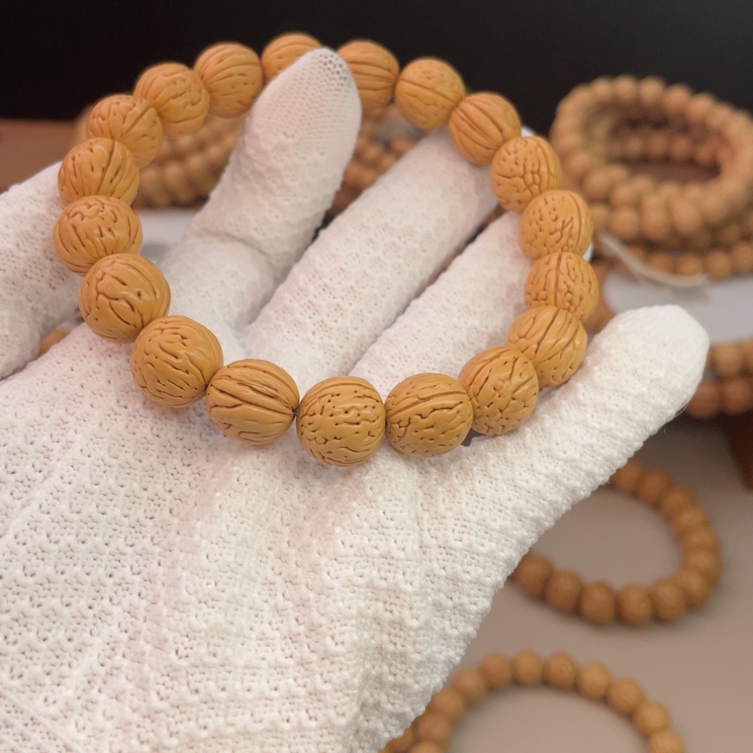 @***阳吊坠桃核野生钱袋子