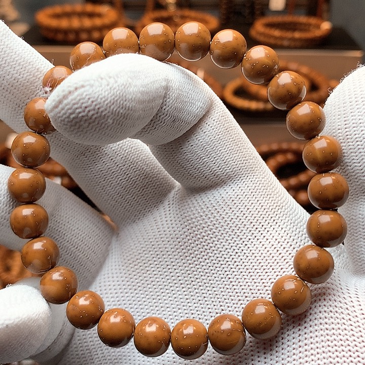 紫金鼠手串9×8.6近圆珠单圈