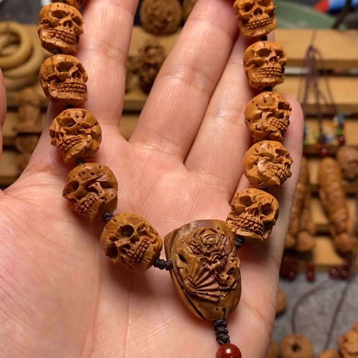 桃核手工雕刻骷髅手持