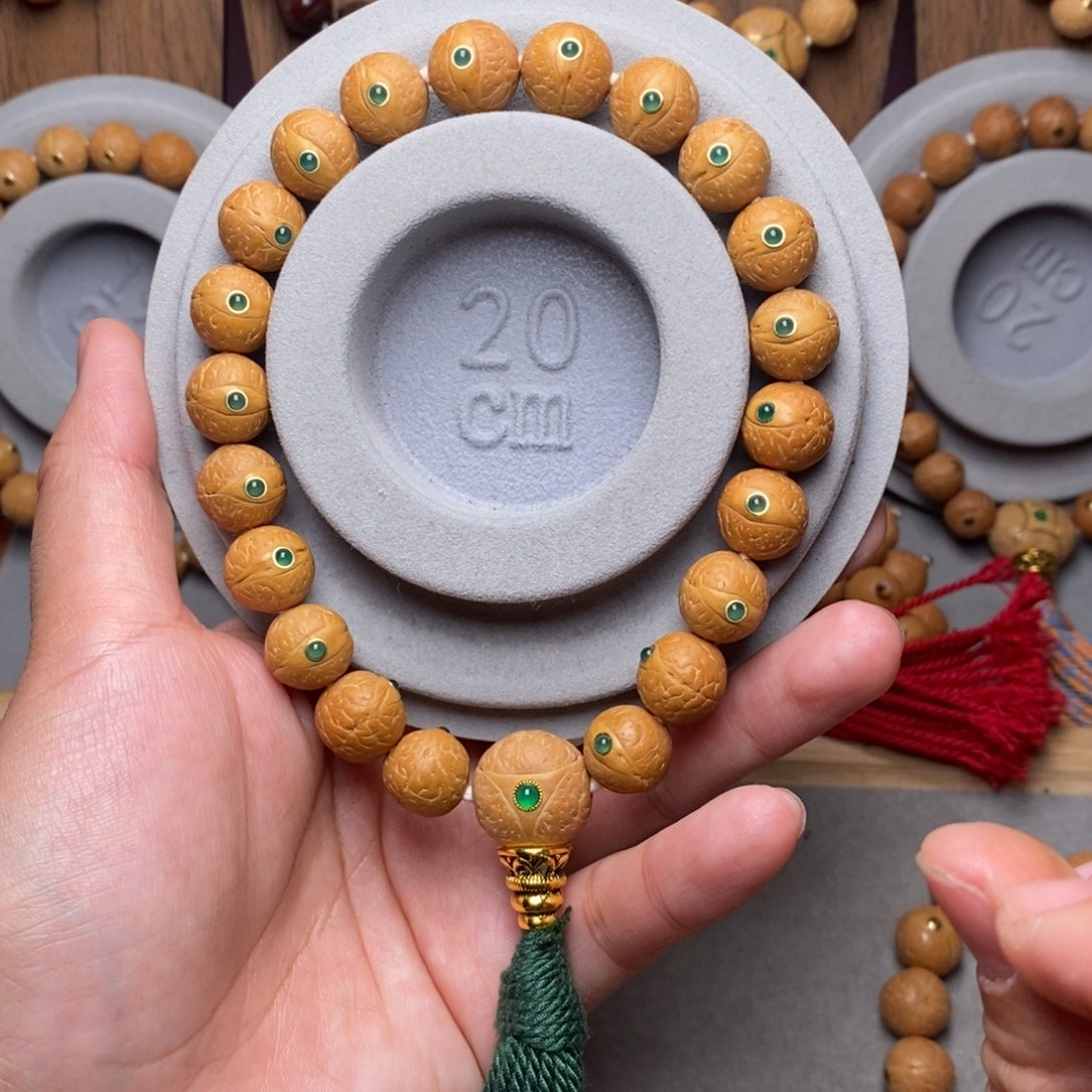 手串凤眼菩提12mm➕绿宝石