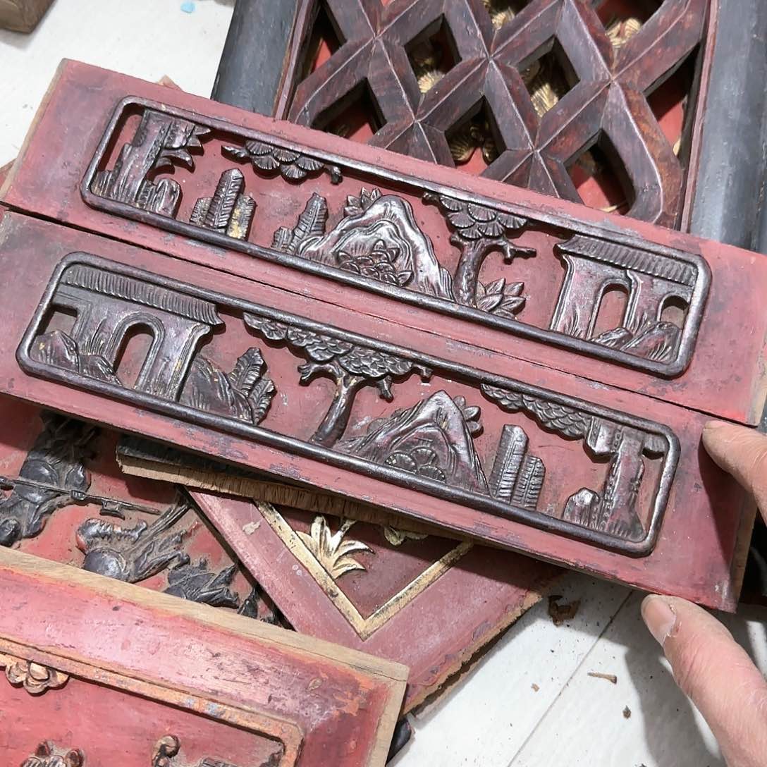 木岸**心老木雕艺术的设计师