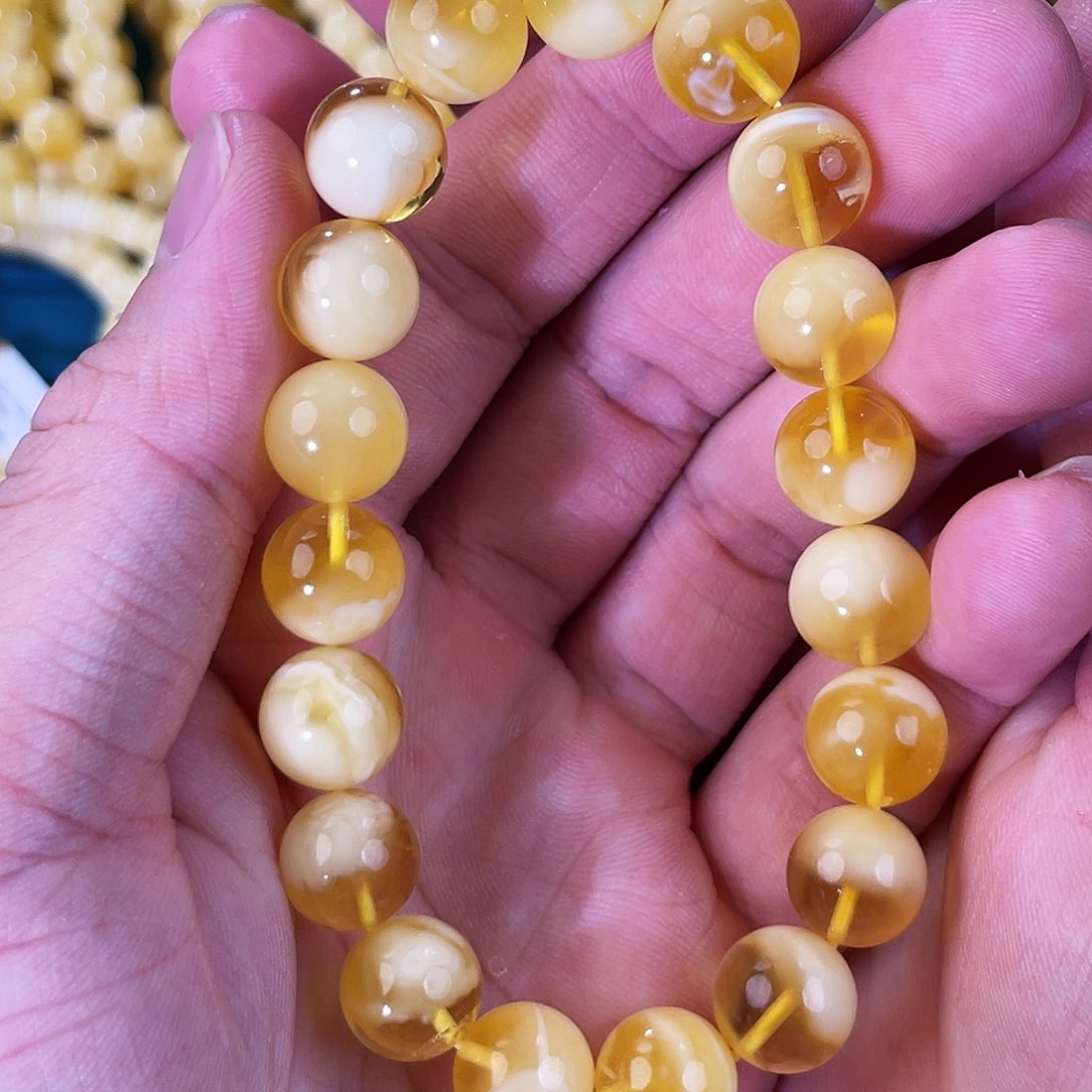 琥珀裸石未镶嵌金白圆珠手串