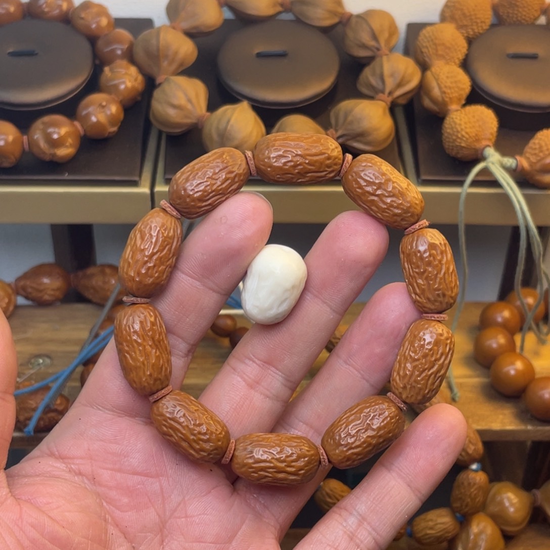 恬***也橄榄核手串/手链1.3梅林水晶核枣