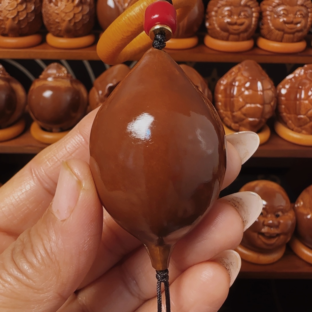 橄榄核把件单面手把件36