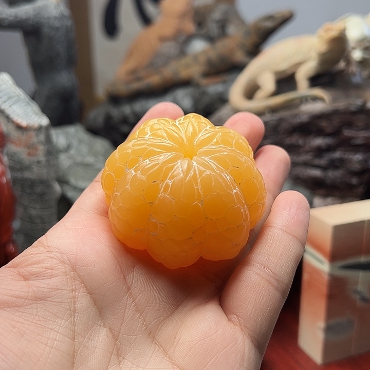 辽宁石橘子手把件