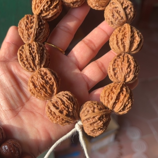 戈***金木质野生秋子手串