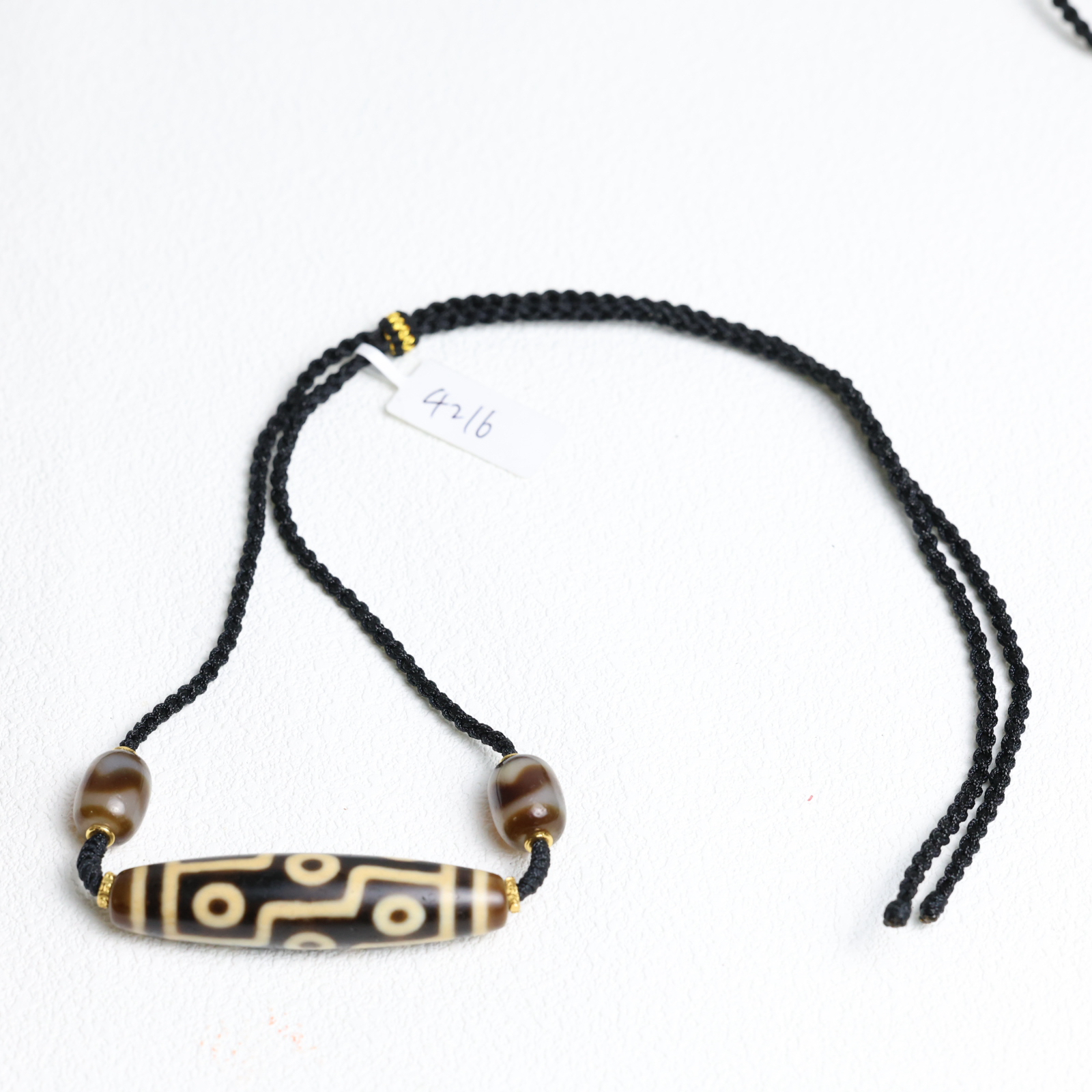 真品牙黄折线九眼天珠项链 男女同款 约54*13mm左右