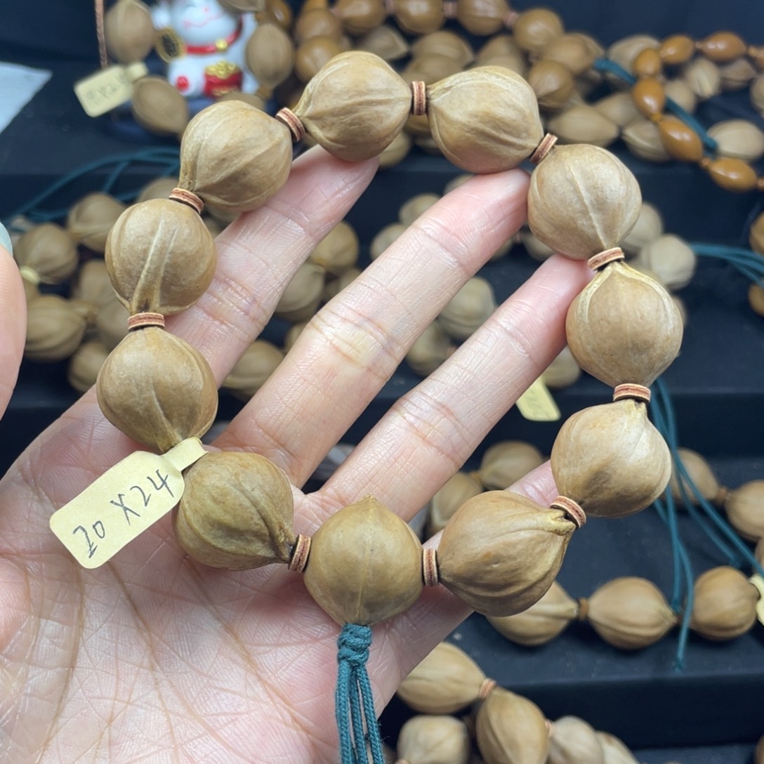 一***生002橄榄核三花20*24