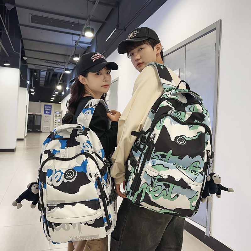 书包女大学生韩版时尚休闲百搭高中生初中生涂鸦双肩包男旅行背包