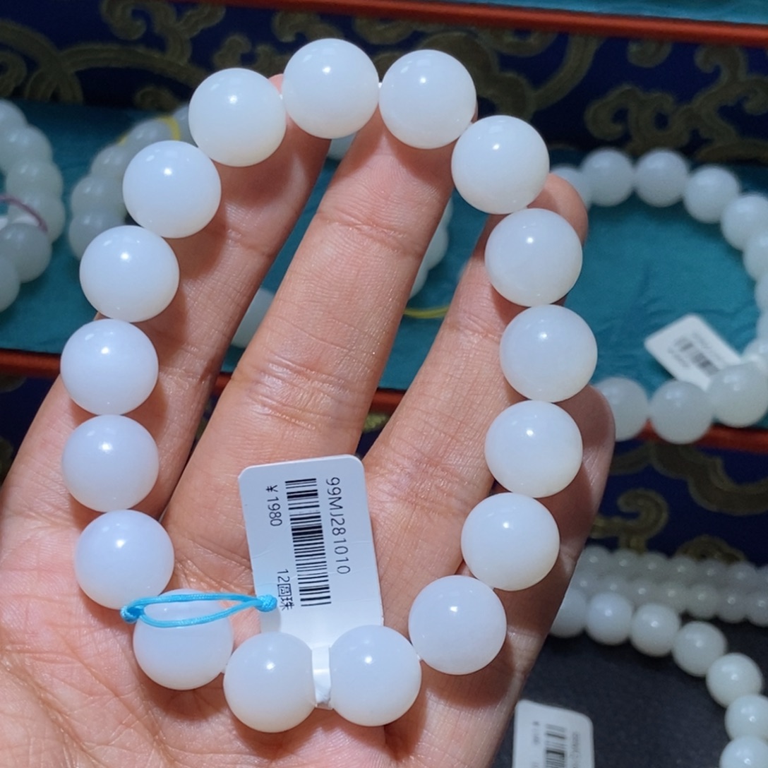 辣***5和田玉未镶嵌手串圆珠卡12
