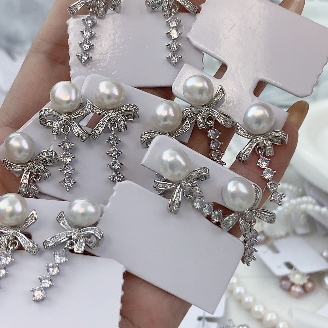 银S925镶嵌耳饰淡水珍珠蝴蝶结