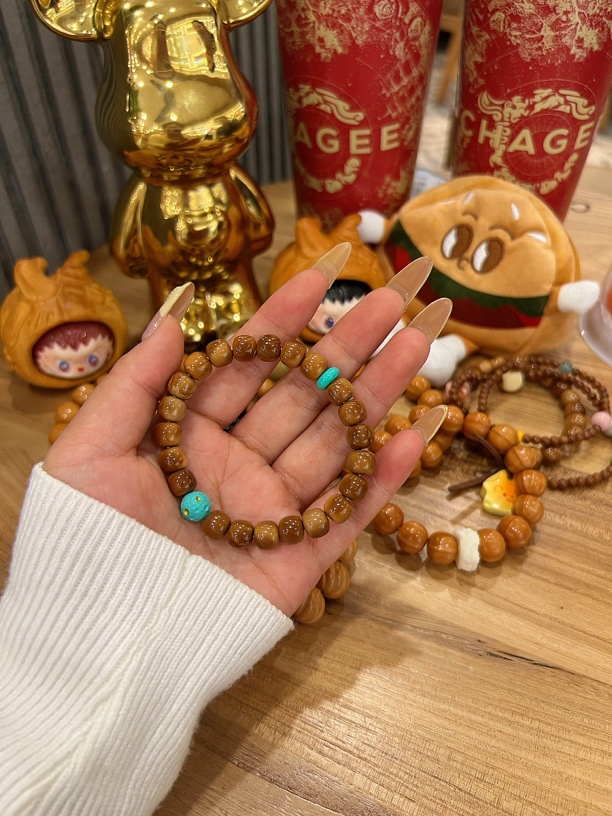 库克搭配快乐星球文玩手串