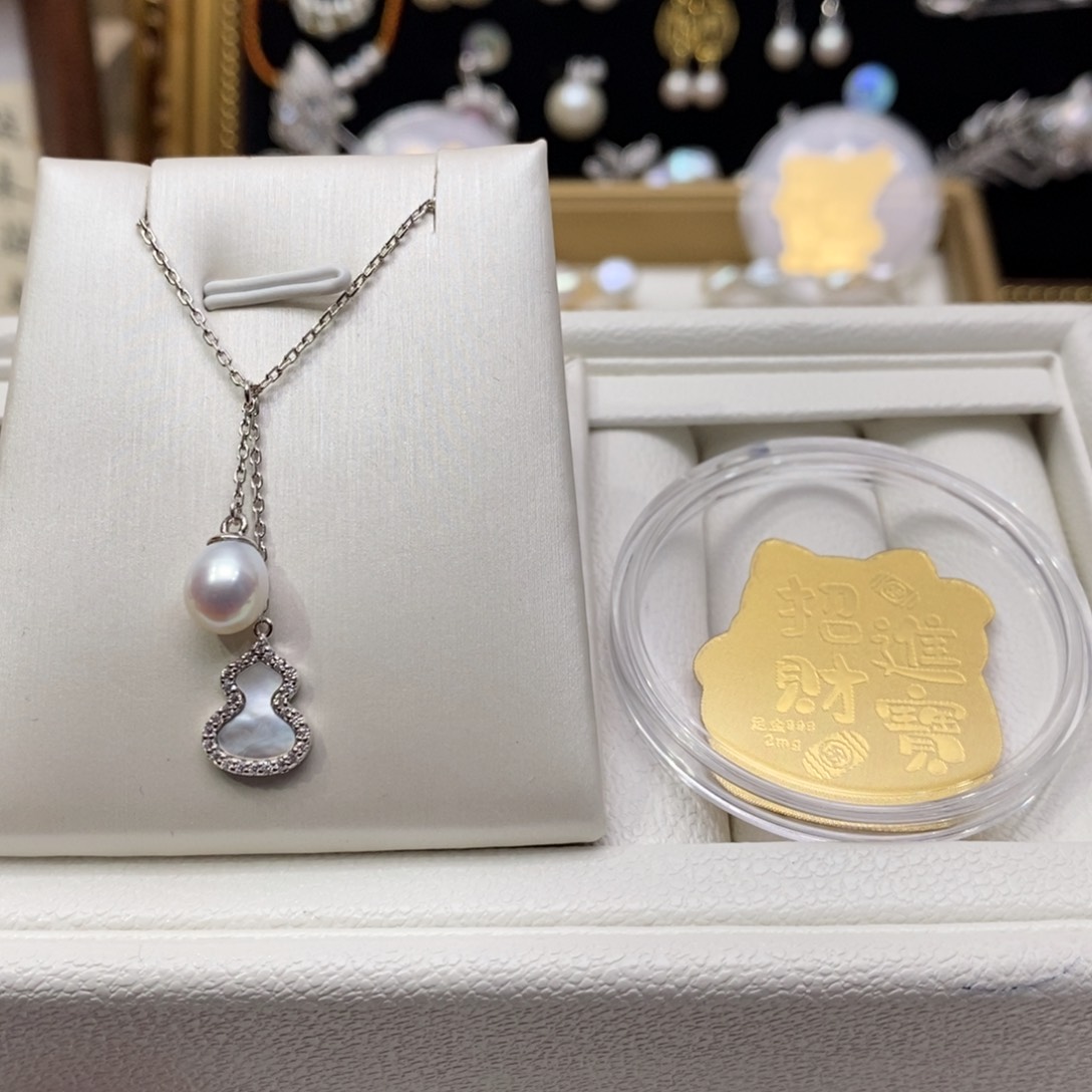 淡水珍珠颈饰银S925镶嵌送足，金手机贴
