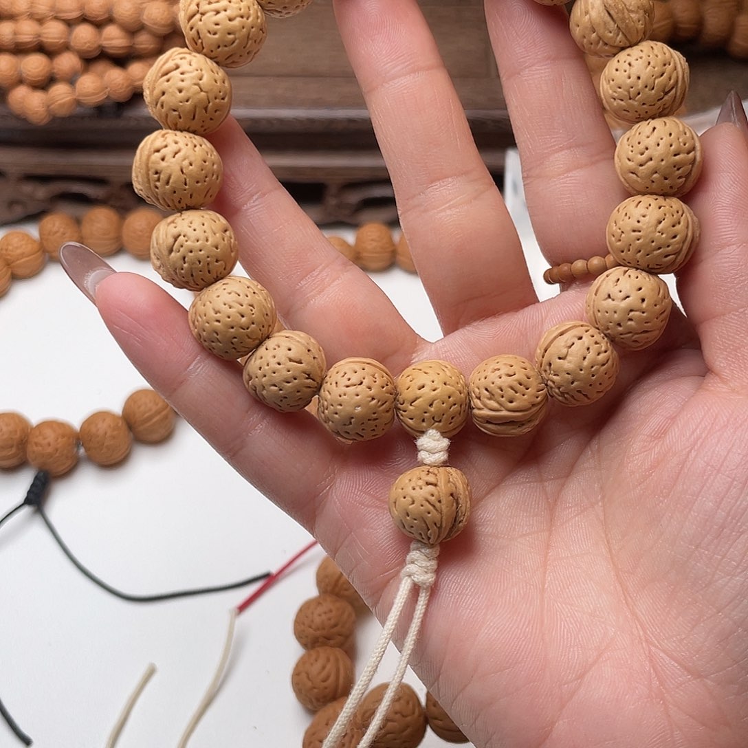 ⎛***⎞14野生大宽脐桃核手持