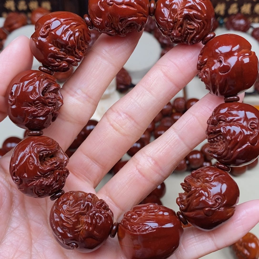 橄榄核吊坠沾***牙恶僧，