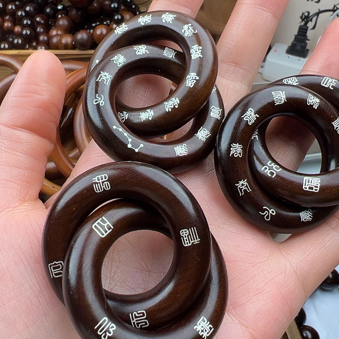 星***八2.5内径枣木玉化镶银双面乾坤圈