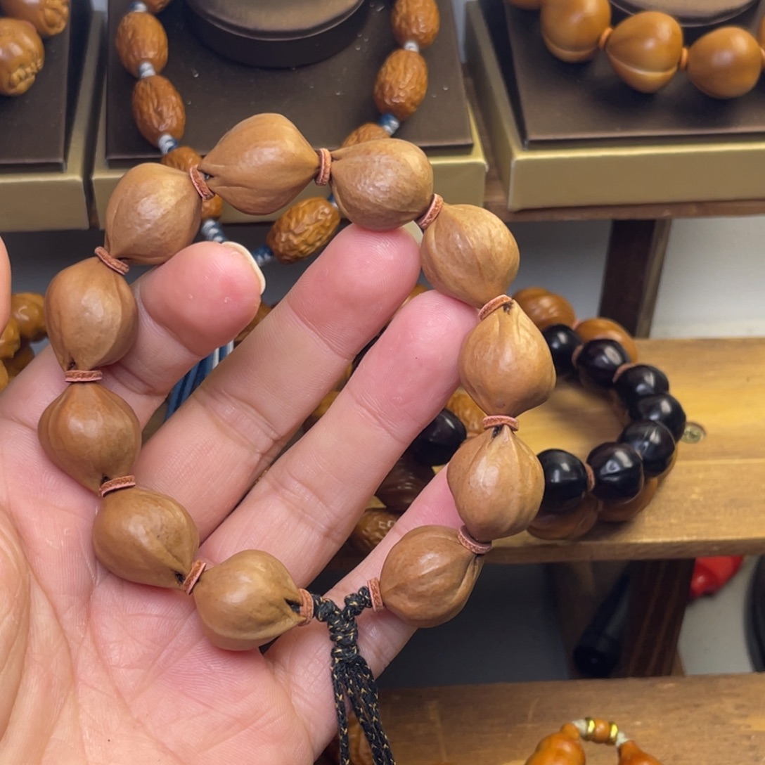 爱***行手串/手链橄榄核1621小铁核 微紫皮