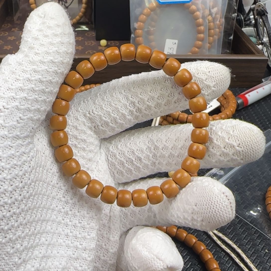 橄榄核吊坠7.8缩7.7mm清水树王橄榄核核尖极限弧单圈