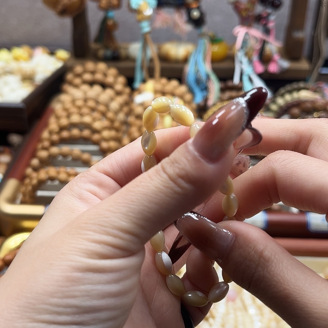 吊坠猴头核桃鱼骨大米单圈手串