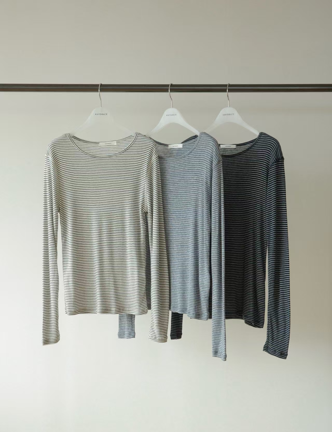 东大门am条纹圆领长袖T/NO退换