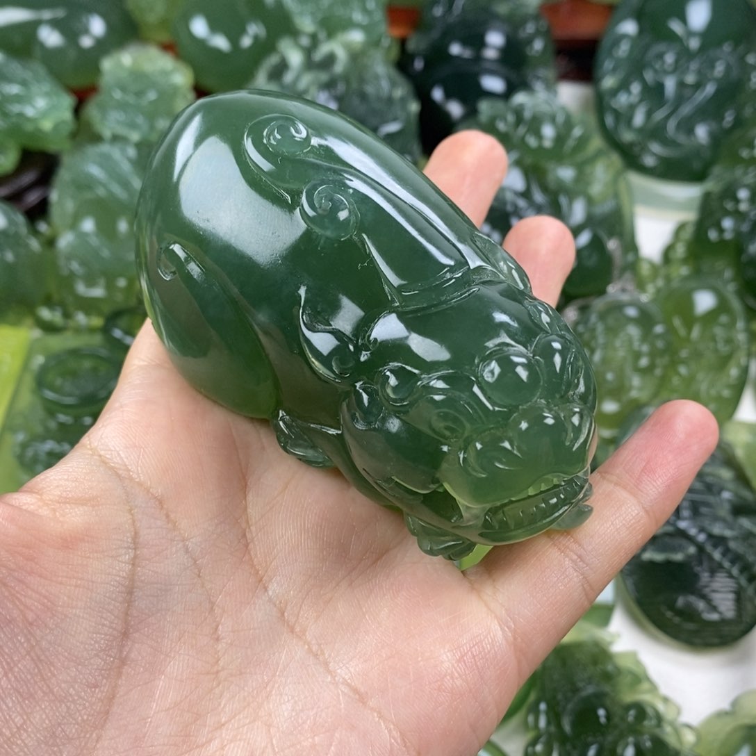 岫玉手把件未镶嵌赵*