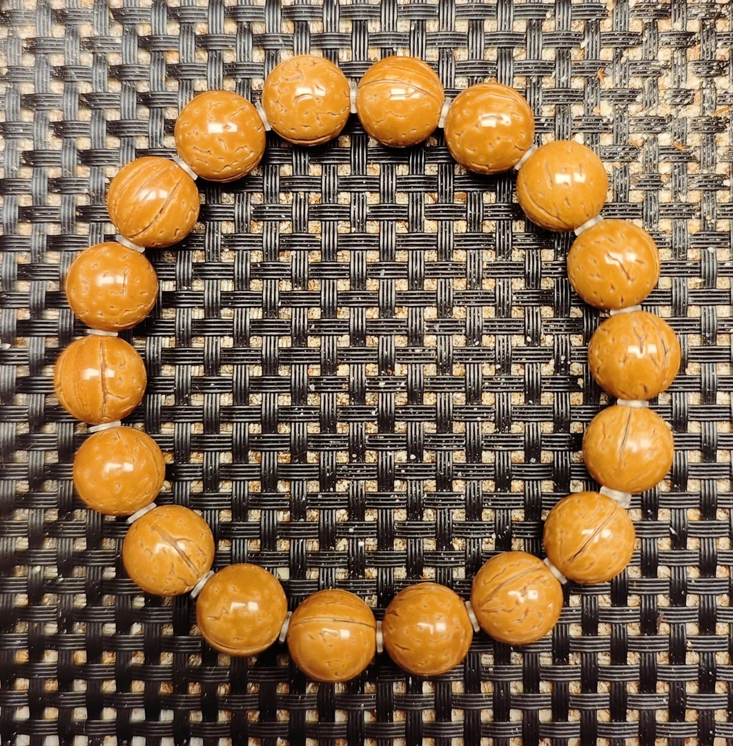 12.7尺寸精品野生红皮桃核光珠手串 