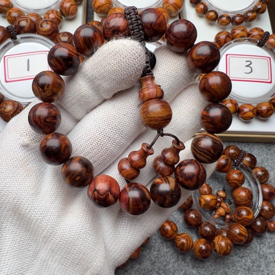 用***5黄花梨/降香黄檀手串/手链1.2黄花梨紫底花纹手串