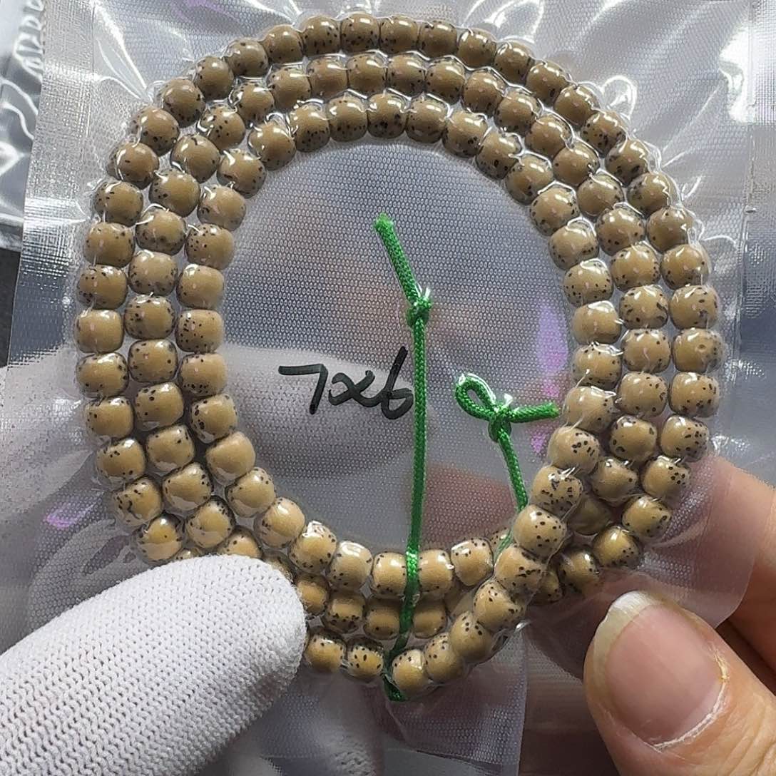 星月菩提把件k****-星月菩提7*6手工黄