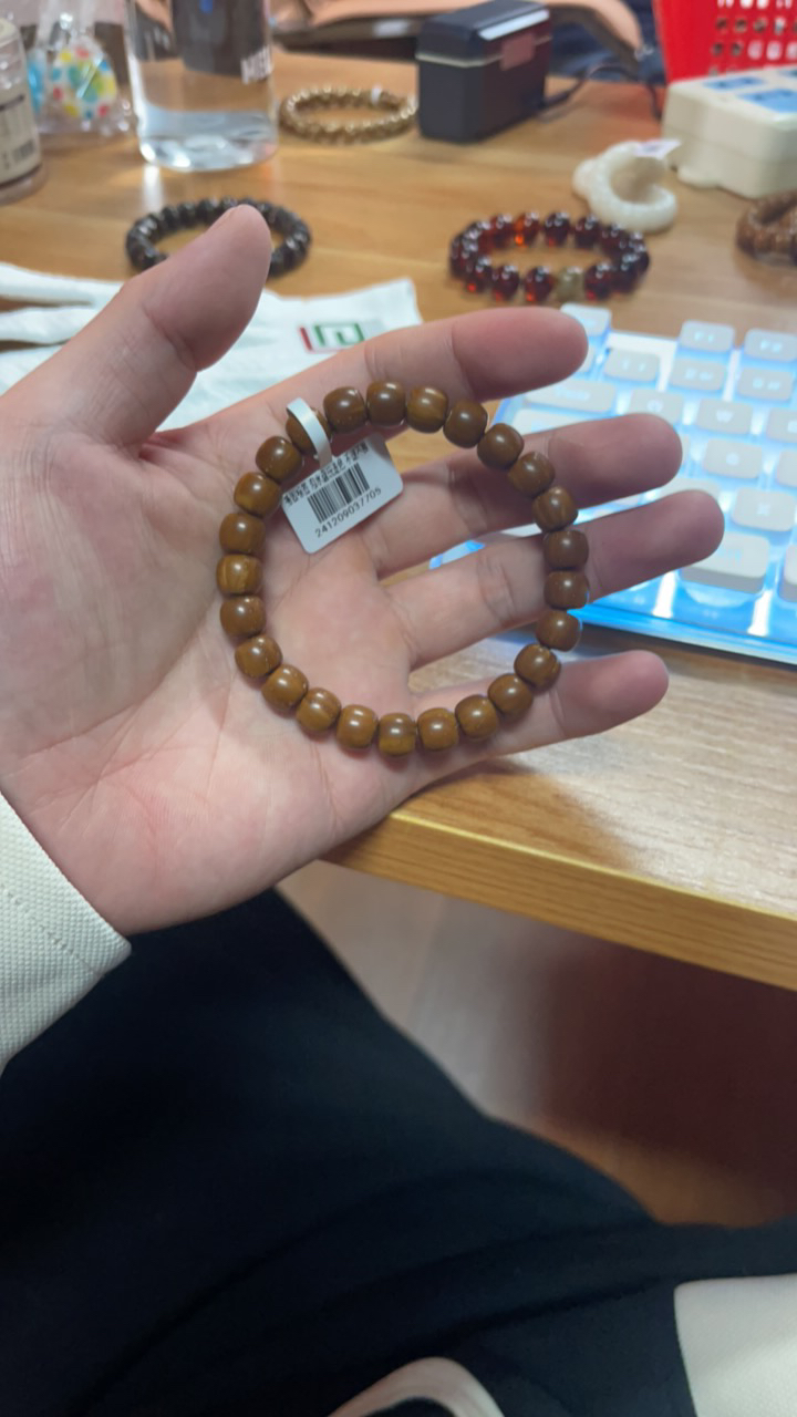 7705实心紫金鼠老型咖皮手串