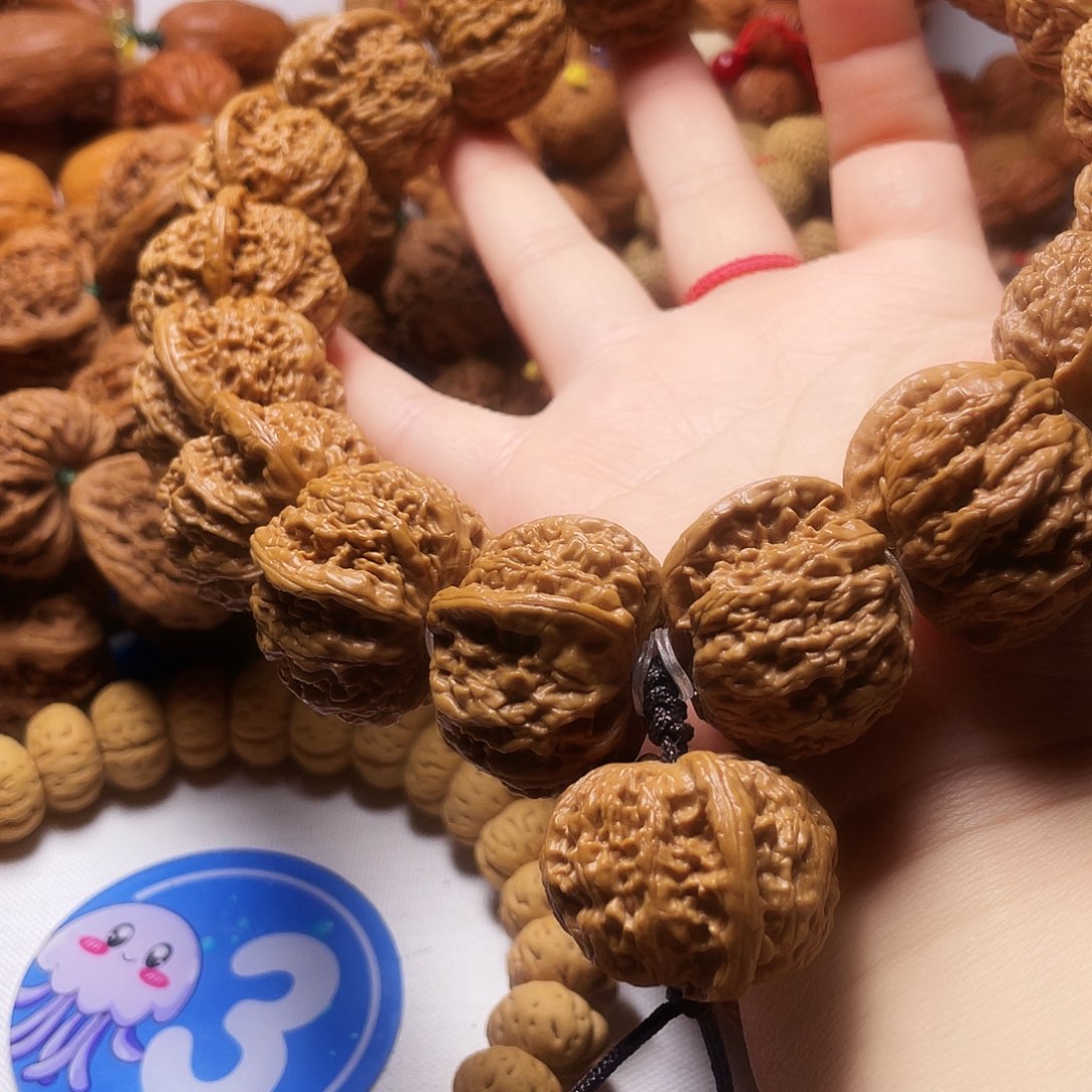 阳***仔吊坠文玩核桃磨盘