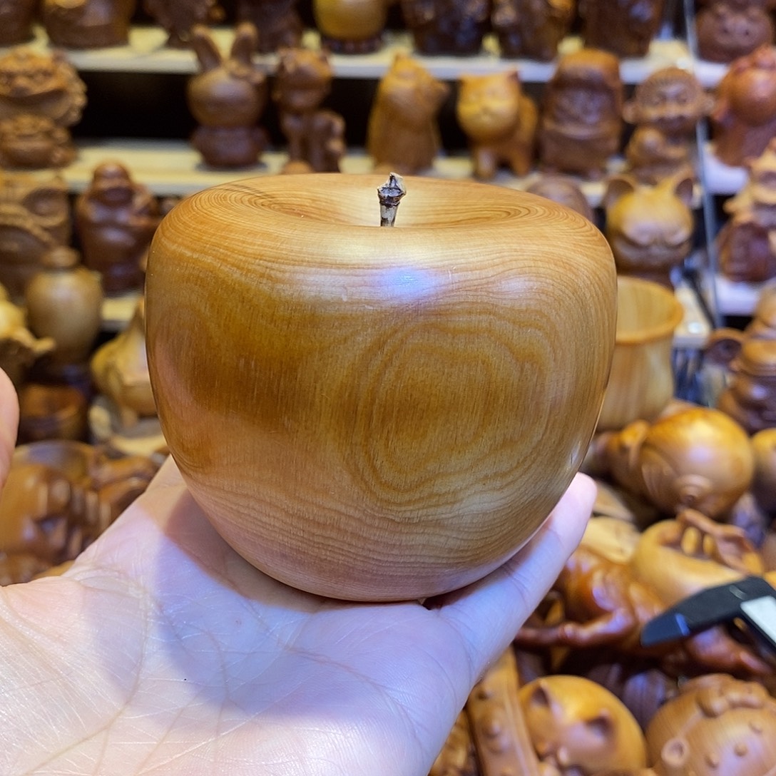 普***山木崖柏木雕手把件